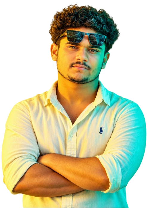 Best digital marketer in Kerala – Professional portrait of a young digital marketing expert wearing sunglasses and a white shirt, representing creativity, confidence, and expertise in SEO, social media marketing, and digital growth strategies in Kerala.
